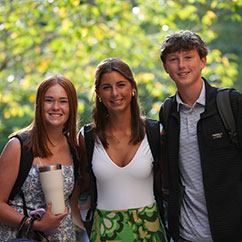 Three students smiling. Links to Gifts of Cash, Checks, and Credit Cards cash.jpg
